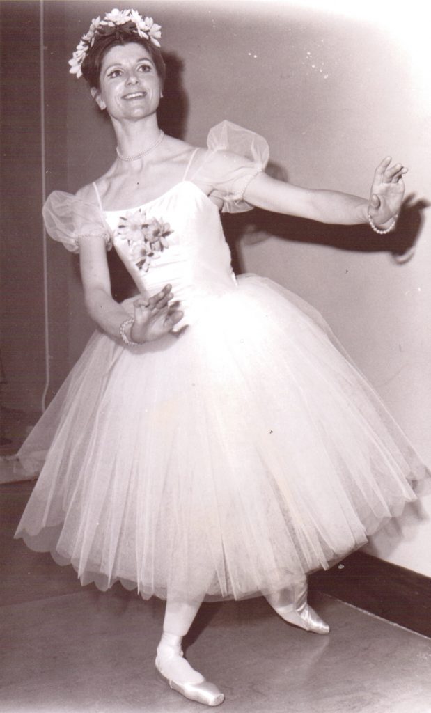 Ballet dancer posing in full tutu